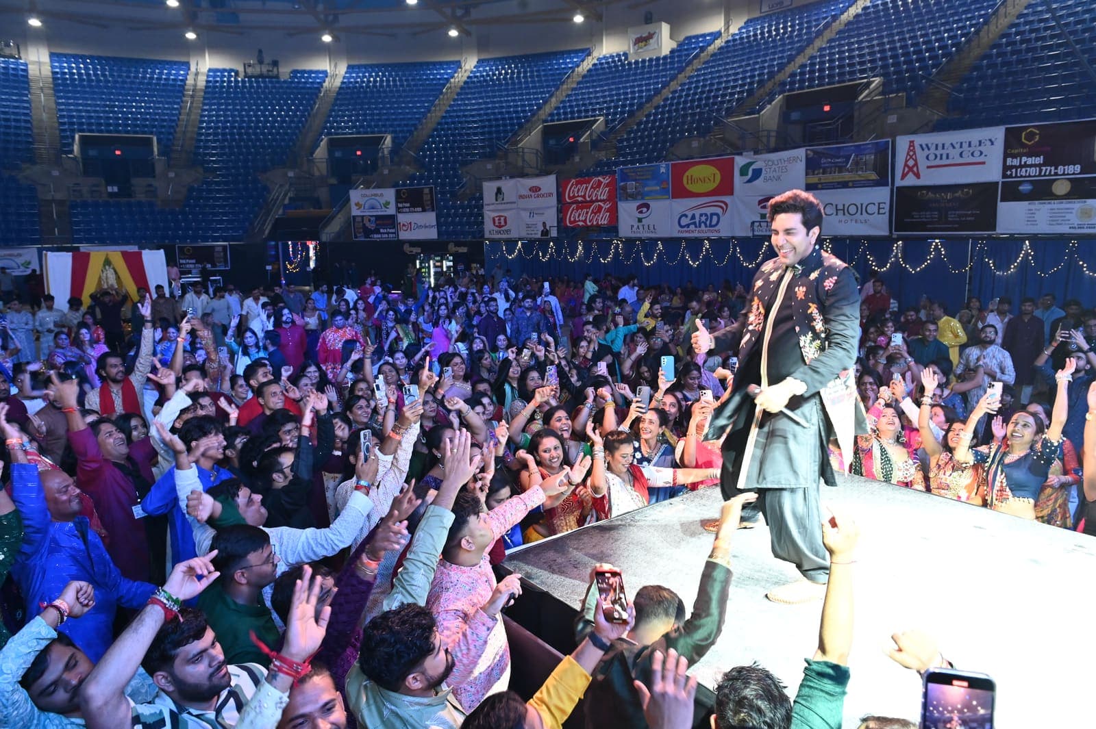Performer greeting an excited crowd at the Columbus Civic Center